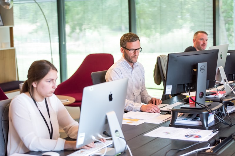 Finance professional reviewing accounting reports